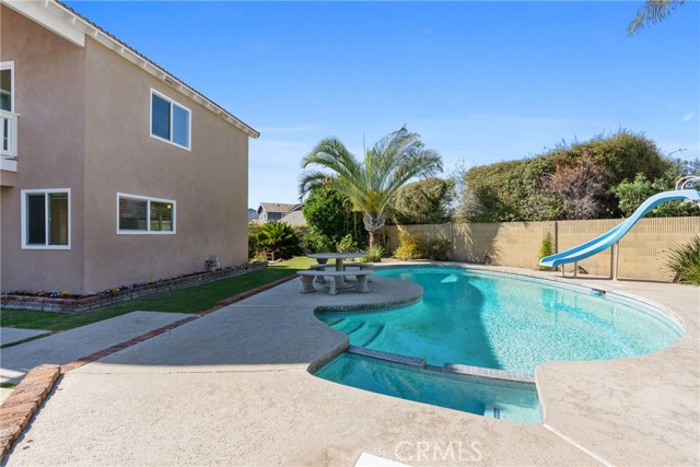 Enjoy fun in the sun around the pool and picnic bench!
