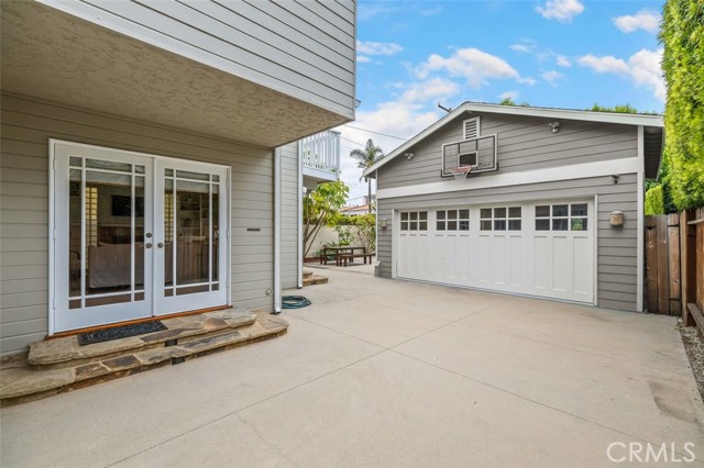photo has been altered to show garage matching the house color