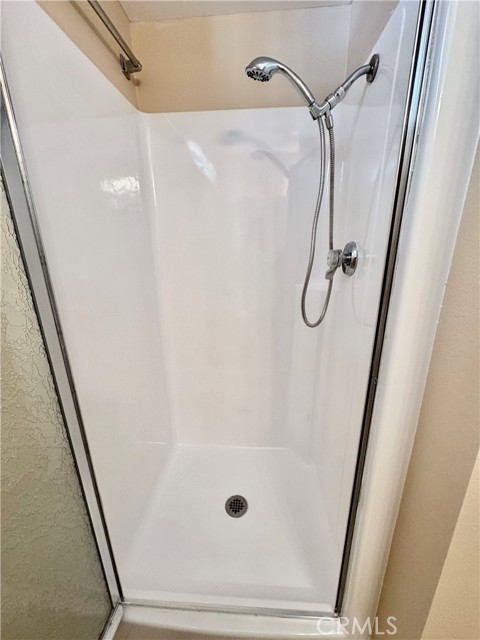 The second bathroom features a convenient stall shower—designed for easy walk-in access.