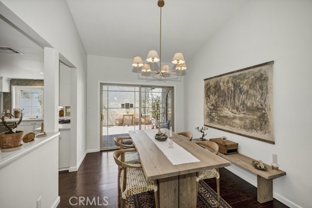 View of dining area with the kitchen located on the Left