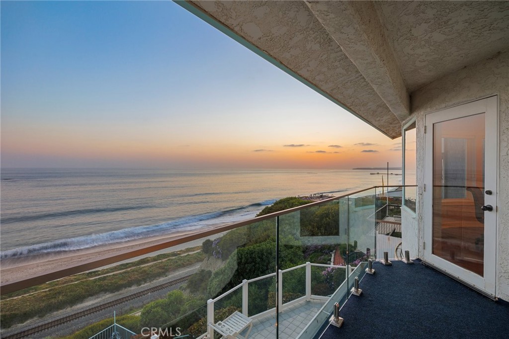 Spectacular Single Family Residence property with an awesome panoramic view of the ocean. Residing on a bluff that has a walkway from the back of the property down to the beach. Custom built back in 1986. Enter the property on the first level and step in to enjoy the Living Room with fireplace. A bar area then separates the Living Room from the Family Room with gorgeous views to the outdoor paitio. There is also a fireplace in this room. The Dining Room also overlooks the patio and has its own beautiful view of the Ocean. The Kitchen includes an eat-in area that also overllooks the patio and ocean view. Appliances include a refrigerator, gas oven, microwave. dishwasher, trash compactor and wine/ beverage cooler. A bay window above the double sink adds to the ambiance of this area. Two bathrooms are on the first level. One is a full bathroom and the other is a half bathroom. Inside laundry with a sink and plenty of storage completes the first level interior. Step out back to the outdoor patio to enjoy the soothing views from the seating areas or the inground rectangular spa. We travel upstairs to the second level and walk in to the primary bedroom that once again overlooks the Pacific Ocean. This room also has its own fireplace and opens out to the second level deck. The deck includes a new glass wall for your safety and security. The primary full bathroom includes a spa tub and a separate shower. There are three additional bedrooms on this level with one of the bedrooms set up as an office with stunning views of the ocean. There is another full bathroom on the level as well. there are many other features that are available to come and see with an onsite visit to this spectacular property. Oh by the way, we also have a three car garage and a circular driveway that provides plenty of parking (8-9 spacws) and inside storage. Come take a look at this riveting opportunity to enjoy the dream of living here! WELCOME INVESTORS!