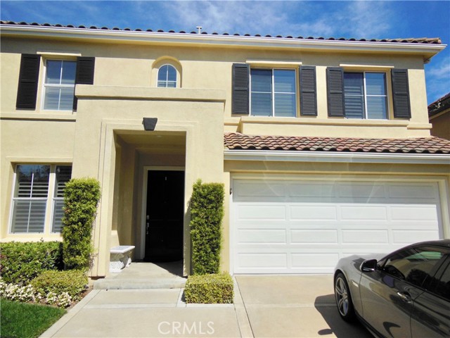 5 Belfort Newport Coast, California Wonderful expanded single family residence home in Newport Coast, located on a private cul-de-sac in the coveted community of St. Michel. Enjoy the expanded light and bright floor plan, shuttered windows, near new custom paint, near new carpet, washer/dryer and refrigerator included., and water filtration. With 5 bedrooms/3 baths + loft (TWO MASTER BEDROOMS) that make this home a rare find. Entertainers private backyard, complete with sitting area, paver hardscape and lush grass combination. The ornate gourmet kitchen has been recently upgraded with stainless steel appliances, refrigerator, double oven, and features a breakfast nook for casual dining. Adjacent to the kitchen, the family room provides a flow through living area for comfort and efficiency. The spacious master suite overlooks the lush backyard and features an en suite bathroom with decorative glass accent tile, large shower, soaking tub,oversized walk-in closet. The community offers two heated pools, BBQ area, spa/hot tub, walking trails, nearby tennis courts, basketball courts, volley ball court and playing fields. In addition, you are just minutes away from the beach, Fashion Island, and Crystal Cove, fine dining and shopping and Newport Coast Elementary.