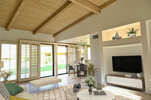 46390 Dove Road Indian Wells, California Welcome to Indian Wells Country Club! This prestigious address is a corner property, tastefully updated & move-in ready. At base of magnificent mountain range, the overlook is wondrous with evening lights. Enjoy views of golf course, mountain range, pool, and open space surrounding your home. Fresh paint throughout and new electrical and plumbing fixtures, just to name only a few of recent improvements. Description space is limited, so to summarize: Incredible living room with wood cathedral ceiling. Attached huge 2 car garage AND golf cart garage with separate garage door. Dining area with bar and chandelier. Pool, about 30 steps away and feels like your own backyard pool. 7 sliding glass doors allows abundance of natural light and view, inviting you to the rear patio and center atrium. All bathrooms with dual sinks, granite top vanities, and brand new skylights. Kitchen with updated appliances and beautiful granite countertop with wide modern design bullnose. TWO 4 ton AC systems; one with a new York condenser. TWO water heaters, one on each side of the house. TWO washer/dryer hookups, in house and in garage. 20 panel electric solar system! Heavy duty designer shutters. Two bedrooms with walk-in closets. New modern design ceiling fans in bedrooms. Gas BBQ hookup in back porch. Indian Wells CC is the original home of the Bob Hope Classic, with a 36 hole championship golf, 70,000 square foot clubhouse with many activities and state of the art wellness center. WOW! Welcome home