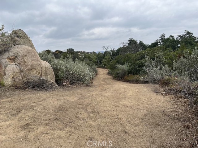 Second drive off main drive that circles down past stream to the 3rd rough graded pad