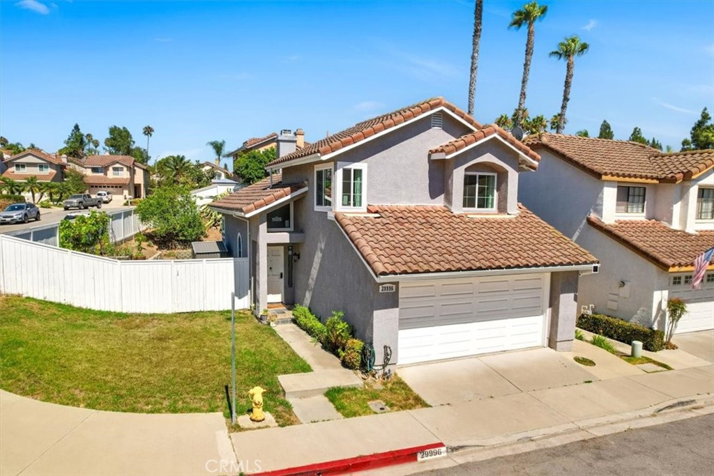 Welcome to this beautifully upgraded home in the coveted Seagate Tract of Laguna Niguel. This turnkey residence offers a seamless blend of modern luxury and comfort, nestled on a spacious corner lot with a newly landscaped yard.  Step inside to discover a bright, open floor plan adorned throughout. The living room, with its soaring cathedral ceilings and cozy fireplace, provides a perfect space for relaxation and entertaining. The adjacent kitchen is a culinary delight, featuring luxurious stone countertops, a stunning backsplash, and high-end appliances including a gas stove, oven, microwave, and dishwasher. The barn-style deep sink and sleek cabinets complete this chef’s dream.  The home’s thoughtful upgrades continue with tile in the showers and a beautifully appointed second bath. The large wrap-around yard, is ideal for outdoor gatherings or quiet retreats.  Upstairs, you’ll find three well-sized bedrooms and two full bathrooms, providing ample space for family and guests. This home effortlessly combines practicality with luxury.  Located just minutes from some of the world’s most stunning beaches, and within walking distance to multiple parks, hiking trails, tennis courts, basketball courts, soccer fields, and playgrounds, this property offers a lifestyle of both relaxation and adventure.  Don’t miss the opportunity to own this exceptional Laguna Niguel home—where modern upgrades meet prime location.