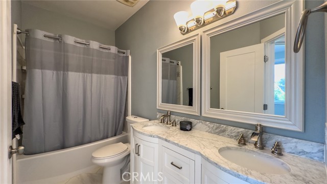 HALL BATH W/ DAUL SINKS.
