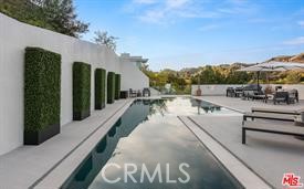 https://media.crmls.org/medias/c68558a7-69b7-49dc-9496-344eb5e55025.jpg?preset=X-Large