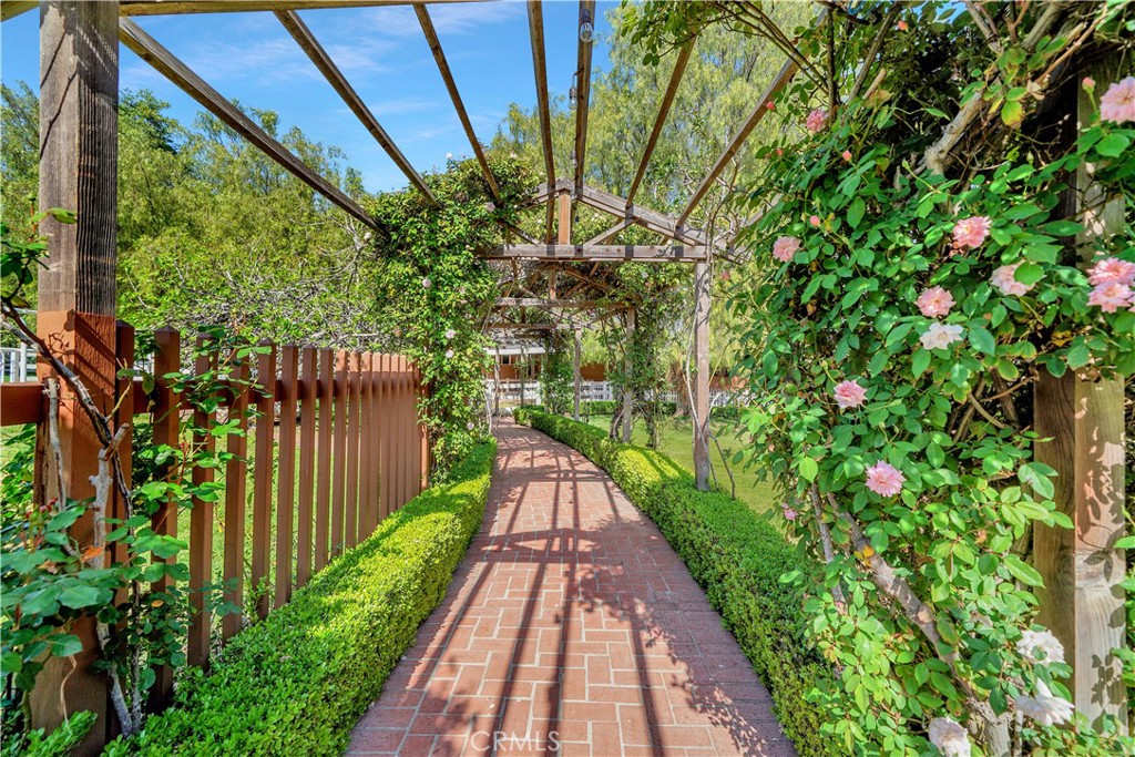 flower covered arbor walkway