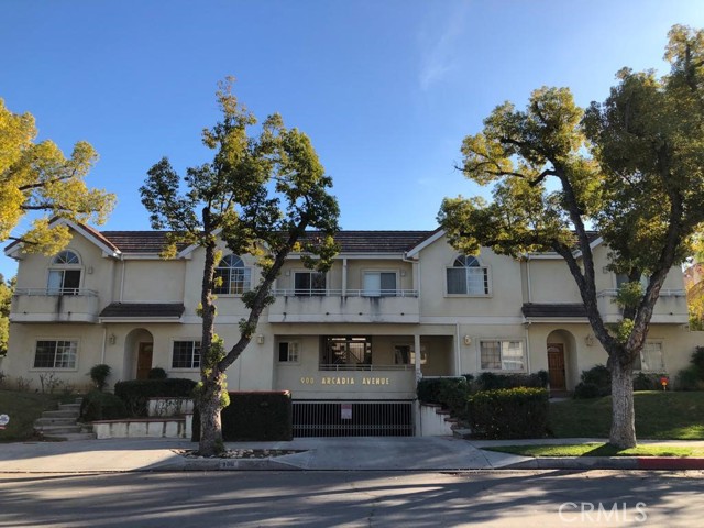 900 Arcadia Avenue 12 Arcadia, California Location! Location! Location! Beautifully maintained luxury condominium centrally located in gated community on a quiet tree line street in Arcadia with award winning Arcadia Schools. Property features a formal entry, open floor plan, vaulted ceilings throughout, laminate floors, ample windows and a nice fireplace in living room. The kitchen with a lot of cabinet space and storage. There is a large private patio on main floor. Upper level features three spacious bedrooms including a master bedroom with high ceilings, walk in closet and a balcony. Inside laundry on upper level. Approximately 300 sqft of bonus room is adjacent to the garage which is not included in the square footage, a very nice space for office or storage. Direct access two car garage is gated. Very good and convenience location: Walking distance to 99 Ranch Market, Banks, Post office, Restaurants, Park and Shopping Mall.