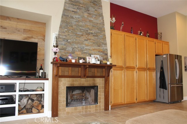 Gas Fireplace and Kitchen Cabinets