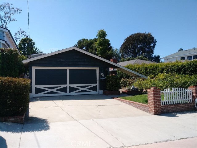 1821 Elm Avenue Manhattan Beach, California If you are looking for a property to remodel or tear down and build new, then look no further. This single level home is located in the prestigious Manhattan Beach Tree Section. Great schools, wonderful beaches and so much more are all close by. The home floor plan features a large living room with a fireplace that opens to the dining area. It may be possible to open up the kitchen to the living room area to create the open concept living space many people are looking for. Come see all the possibilities this property and location has to offer before it's sold.