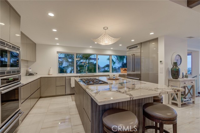 Gourmet kitchen with ocean peeks to South