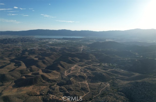 Located in the heart of the Temescal Valley in the City of Lake Elsinore, North Peak is a ±953-acre, unique master-planned community that is
being proposed as a rezone to light industrial. The offering includes an existing specific plan, EIR, Water and Development Agreement.
• Located within the third fastest growing city in California.
• Located within 2 miles of the Nichols Road Freeway Offramp.
• The area offers an abundance of recreational opportunities and the Lake Elsinore “Dream Extreme.”
• Easy access to multiple retail centers within minutes from each development including: Costco, Lowes, Target, and Home Depot along with a variety of restaurants.
• Lake Elsinore features a quaint Historic Downtown area with several restaurants, City Hall and city parks.
• The Lake Elsinore Factory Outlet Mall is located a few minutes from the project and features premier shopping with over 45 name brand stores and restaurants.