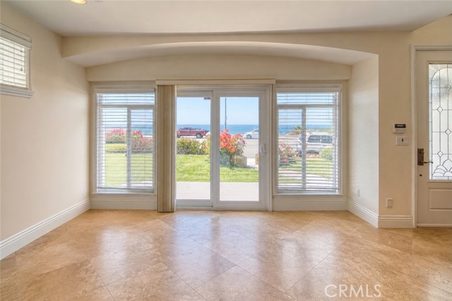 Entry level flex space with furniture removed virtually Entry level flex space with furniture removed virtually