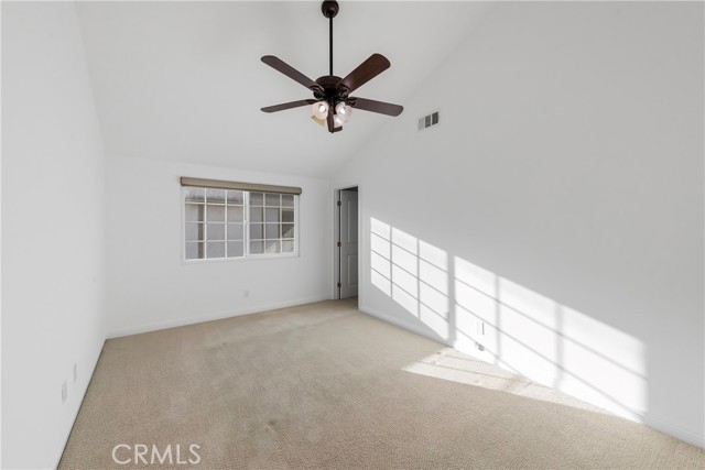 Walk-in closet in this secondary bedroom