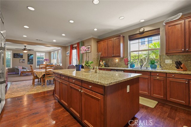 Large Kitchen is adjoined to kitchen dining area and family room with fireplace.