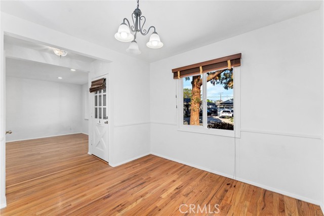 View of front door from interior, lots of natural light!