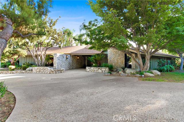 2121 N Laurel Avenue Upland, California A rare peek into an original slice of The California Good Life. This fabulous residence is a stand out in Mid Century style and sophistication. Designed by noted Architect Boyd Georgi in 1965 for James and Katherine West, Georgi's innovative design and craftsmanship are a shining beacon of aesthetic beauty and bold idealism. This landmark estate is ideally situated on a very private almost 1 acre lot on one of the most the most exclusive cul-de-sacs in north Upland. The residence features the extensive use of glass and an array of natural materials that combine harmoniously with the lush landscape and sparkling swimming pool. This home has been featured in The Los Angeles Times, Home Magazine and other media. The residence's bold hexagonal design is centered around the custom designed swimming pool, with doors that open wide on to the full patio for seamless indoor/outdoor living year round. Beautiful wood ceilings, built-in's, original terrazzo floors and a feeling of living on vacation, or the set of "Mad Men". Weather entertaining friends or relaxing at home this spectacular residence provides the perfect setting . Newly remodeled kitchen and appliances. Available move in date: Now. Enjoy! Pool service and gardener included.
