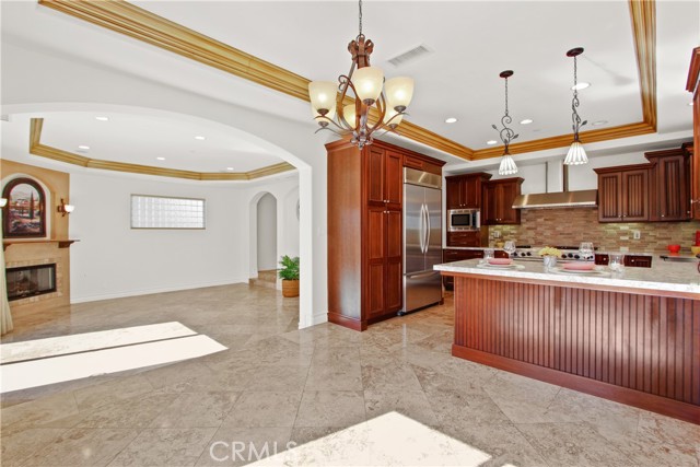 Open floor plan with living room, dining room, and kitchen.