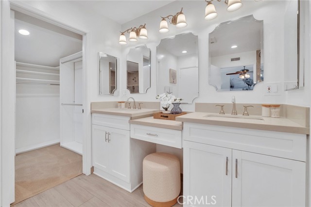 Double sinks and lots of custom cabinets