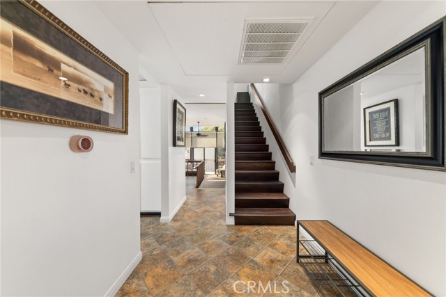 Stairs leading to the fully functional upstairs suite.
