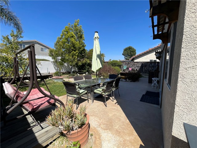 There is room for an outdoor table and sitting areas around the patio.