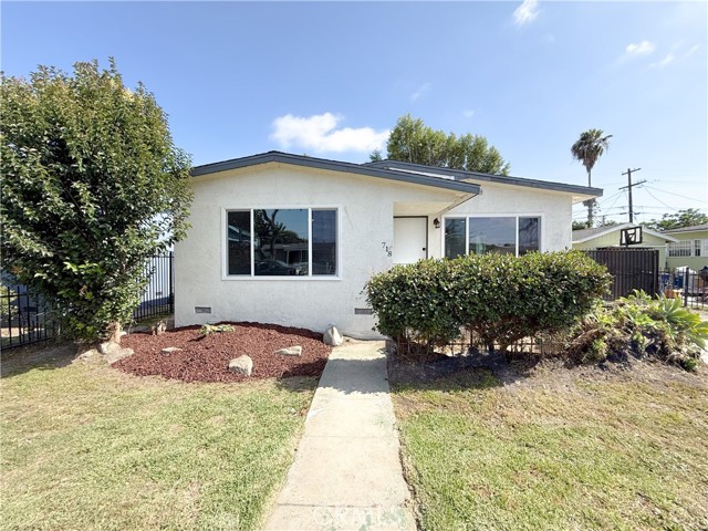 718 East 103rd Place