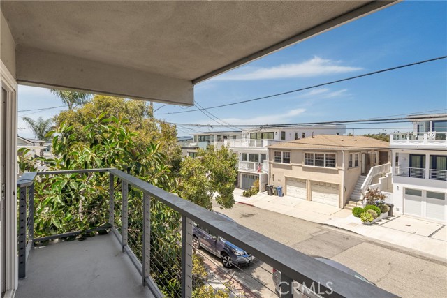 Covered balcony on the upper unit great for enjoying beach breezes