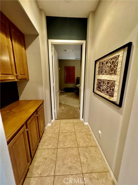 Separate hallway to Primary suite with attached Master bath.