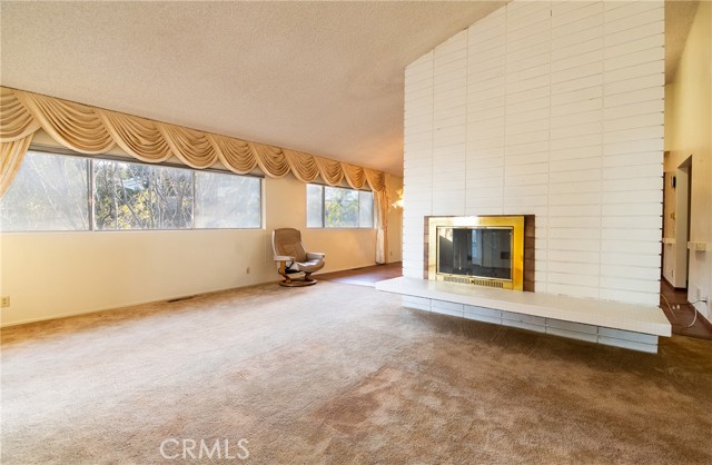 Dual-sided fireplace in living room