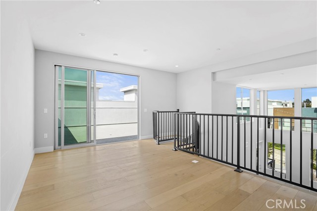 Loft looking out to huge rooftop deck.