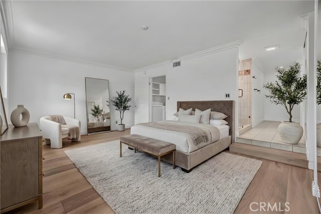 Primary suite with custome closets. Virtually staged. Primary suite with custome closets. Virtually staged.