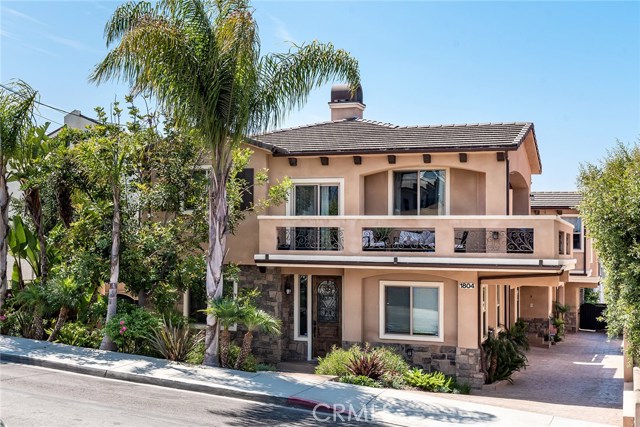1804 Vanderbilt Lane C Redondo Beach, California Hurry on over!!! Rare find in one of the best Westerly locations of North Redondo Beach. This sophisticated zen like 4 bedroom/3.5 bathroom home offers a south facing sun drenched yard walking distance to a lovely park and shops. Located just 1 mile from one of the best beaches in the USA, Hermosa Beach, this rear unit townhome offers extreme privacy being perched above your neighbors. This Spanish Revival home offers distressed hardwood floors throughout, plantation shutters, high vaulted ceilings and Air Conditioning. The gourmet kitchen offers granite counters and all stainless steel appliances which opens to a great room complete with built in media center, fireplace, and wet bar with built in beer kegerator. Do not miss the Spa like master suite with dual sink vanity, separate tub and glass enclosed shower plus large walk in closet. Lovely private back yard is perfect for entertaining, BBQs, pets and gardening. Walk to Starbucks, the new Chick-fil-a, and even the public library. Attached spacious 2 car garage. All of this is located with-in the award winning Redondo Beach School District.