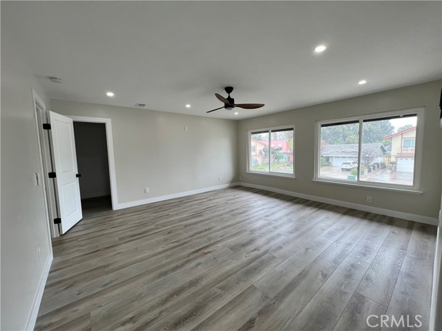 Super sized master bedroom with nice street views, walk in closet , recessed lights and designer fan that can be wifi enabled