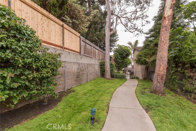 Park-like path that leads from Pool area to gated access on Madison St