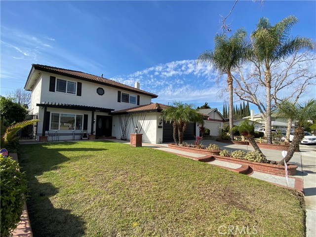 Extra long driveway leads to 2 car garage