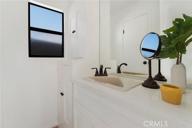 Second vanity in Primary Suite, perfect for a dressing area.