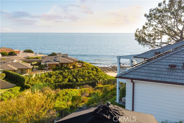 Perfectly positioned atop the private bluffs in Corona del Mar, 186 Shorecliff Road offers a unique opportunity to see, hear, smell, and feel the ocean breezes each and every day for a coastal sensory immersion unlike any other. The home's elevation on the North canyon bluff affords tremendous ocean views above the Cameo Shores community and beyond to Pelican Hill Golf Course. The lines between indoor/outdoor seem indiscernible with nearly 1,500 square feet of usable deck space for entertaining, dining al-fresco, dolphin/whale watching and relaxing to the ever-present sound of waves softly crashing. The property draws in an abundance of natural sunlight through over-sized windows framing the coastline and lush palms on the horizon. A serene kitchen boasts crisp granite, Gaggenau and Sub Zero appliances, elegant under-cabinet mood lighting, and a water filtration system with beverage chiller. Quality construction materials and rich architectural detailing create a harmonious blend of textures throughout.The kitchen unfolds into the dining area and living room with plentiful space for everyday enjoyment while watching and listening to boats and sea-life pass by. A rare 14,000+ square foot lot allows privacy, lush foliage, a grassy back yard and endless gardening and outdoor activities. Morning Canyon's serene fresh-water creek babbles through the rear yard creating an added layer of serene sights and sounds amongst nature. The private Shore Cliffs beach gate is less than 10 steps away from the home's entrance and offers the convenience of immediate beach enjoyment. Resort-styPerfectly positioned atop the private bluffs in Corona del Mar, 186 Shorecliff Road offers a unique opportunity to see, hear, smell, and feel the ocean breezes each and every day for a coastal sensory immersion unlike any other. The home's elevation on the North canyon bluff affords tremendous ocean views above the Cameo Shores community and beyond to Pelican Hill Golf Course. The lines between indoor/outdoor seem indiscernible with nearly 1,500 square feet of usable deck space for entertaining, dining al-fresco, dolphin/whale watching and relaxing to the ever-present sound of waves softly crashing. The property draws in an abundance of natural sunlight through over-sized windows framing the coastline and lush palms on the horizon. A serene kitchen boasts crisp granite, Gaggenau and Sub Zero appliances, elegant under-cabinet mood lighting, and a water filtration system with beverage chiller. Quality construction materials and rich architectural detailing create a harmonious blend of textures throughout.The kitchen unfolds into the dining area and living room with plentiful space for everyday enjoyment while watching and listening to boats and sea-life pass by. A rare 14,000+ square foot lot allows privacy, lush foliage, a grassy back yard and endless gardening and outdoor activities. Morning Canyon's serene fresh-water creek babbles through the rear yard creating an added layer of serene sights and sounds amongst nature. The private Shore Cliffs beach gate is less than 10 steps away from the home's entrance and offers the convenience of immediate beach enjoyment. Resort-style grounds embrace a courtyard, spa and grassy backyard with room for a pool. Shore Cliffs has become one of the most coveted landings in Orange County; with two private beach access gates, impeccably manicureed grounds and charming tree-lined streets. Shore Cliffs is nestled near the bluff-front trails to Crystal Cove and also a short walk or bike ride to the bustling energy of Corona del Mars village scene lined with dining, shopping and local seaside coffee shops. 186 Shorecliff Road affords the best aspects of a California Riviera lifestyle.