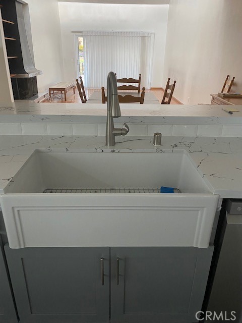 Beautiful large sink and opening to look at dining and living areas