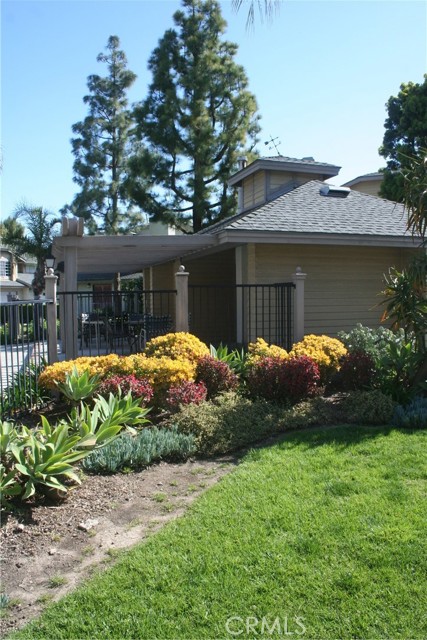 Lush foliage and flowers around the complex