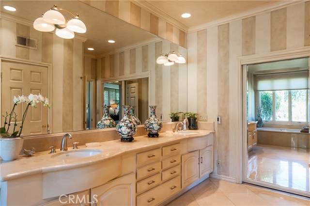 Master bath has dual sink vanity and separate closet.