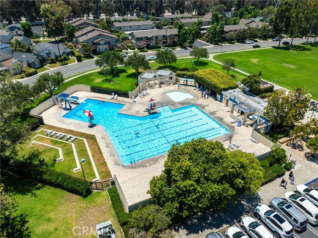 This is one of 24 swimming pools in the Woodbridge Village neighborhood. With lap pool, diving boards, kiddie pool and spa open all year long, everyone can have a great time here.