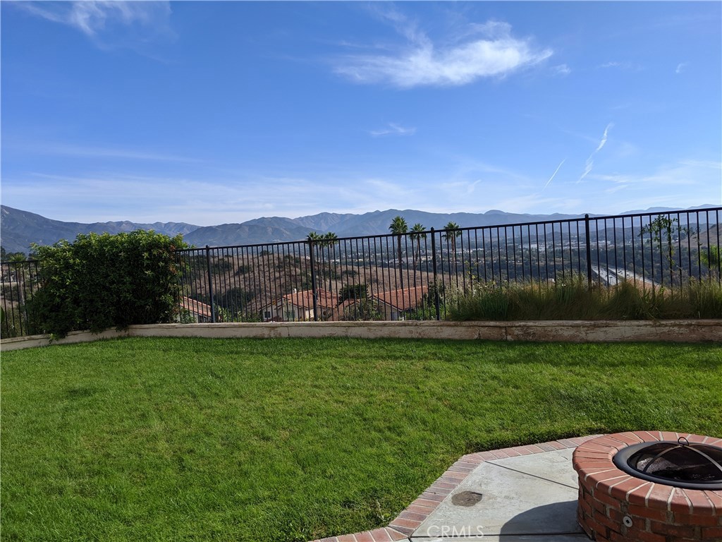 Enjoy these UNBELIEVABLE VIEWS!  190 Degree Views of Mountain and City Lights adorn this 4 Bedroom, 2.5 Bath Home located on a small Cul-de-Sac of 8 homes.  Step into a two story Entry overlooking a Formal Living Room and Dining Room, Cathedral Ceilings that afford lots of light and many windows to enjoy the views while entertaining.  Convenient kitchen with recessed lighting, granite counters, lots of cabinets and open to Family Room with Fireplace and a sliding door that opens to a Large Pie-shaped Pool-sized Yard.  Next to Family Room is Downstairs Powder Room and Inside Laundry Room with Direct Access to 2 Car Garage.  Open staircase leads to 4 Bedrooms Upstairs with a Master Suite where you can enjoy the Mountain Views.  Master Bathroom with separate dressing area including dual sinks, walk-in closet, tub/shower and private water closet. Welcome to the Arroyo Vista/Oaks Neighborhood offering the homeowner's their own Private Park, Pool, Spa, Tot Lot, Sport Courts, Picnic Area. The schools Arroyo Vista K-8 and Tesoro High School are highly rated. Enjoy the convenience of living in a planned community with easy access to Toll Roads, Freeways, Shopping and Dining and full access to the Master Association, SAMLARC offering its many parks with tennis courts, pools, spas, sport fields the Beach Club with its Public Beach to Rancho Residents and Lake surrounded by a 1.5 mile walkway to enjoy the many restaurants on the Lake and Mountain Views getting your walk in for the day!