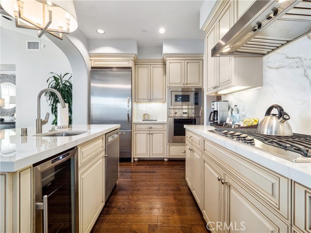 Fully equipped kitchen features Viking appliances & Cuisinart cookware.