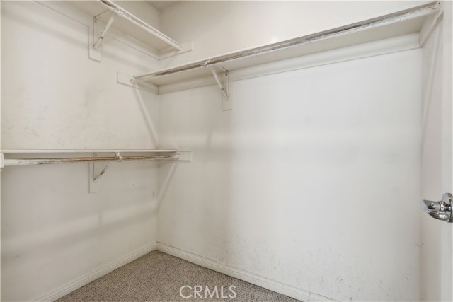 ONE OF TWO PRIMARY CLOSETS ONE OF TWO PRIMARY CLOSETS