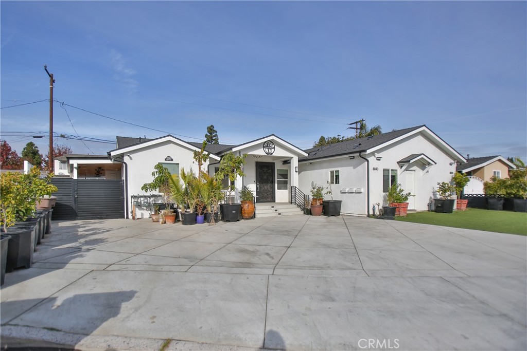 Welcome to 8841 Imperial Ave! A beautiful residence conveniently located in Garden Grove with many local amenities that the city has to offer. This property includes 3 residential units: a primary home, an ADU and a JADU. The primary home is 2,040 square feet, consists of 4 bedrooms and 4 bathrooms, fully rebuilt in 2020 with new windows, central AC/heating system, upgraded kitchen and bathrooms, 6-foot wide bathtubs with Italian tiled walls and floor, and countered closets and working stations available in most of the bedrooms. The ADU is 507 square feet, consists of 2 bedrooms and 1.5 bathrooms, built in 2020 with inside laundry hook-up and mini-split AC system. The JADU is 356 square feet and consist of 1 bedroom and 1 bathroom. The patio cover is permitted and covered with stained wood sidings, outdoor fans and barbeque area. All 3 units have separate addresses. Low maintenance outdoors with synthetic turf and pavers in front yard, masonry block walls and concrete pavement in side and backyard. Plenty parking spaces for all occupants. No detail has been spared on the construction work. Book your showing appointment today!