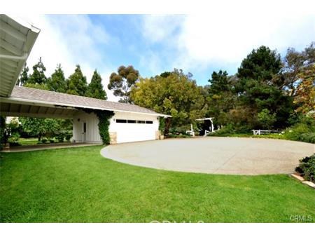 Garage with covered carport and open parking