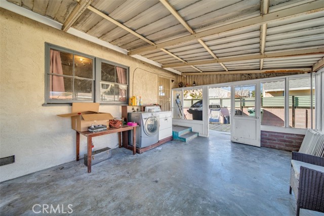 Sunroom where laundry hook ups are located