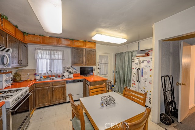 kitchen view down the hall to den area