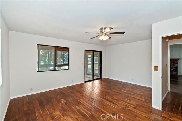 Large main floor bedroom, just painted with enclosed deck